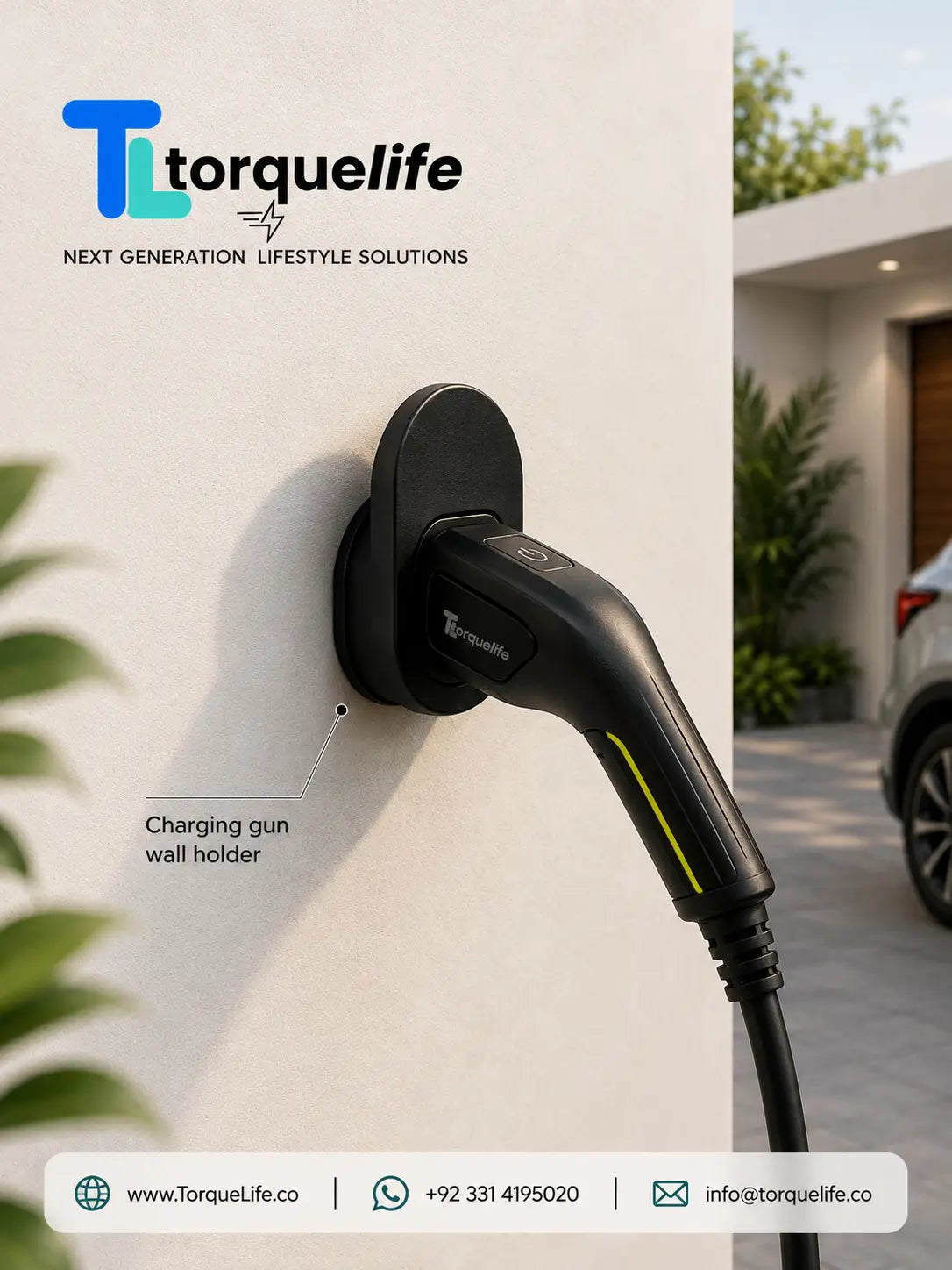 A black Torquelife EV charging gun wall holder mounted on a white exterior wall, with a charging connector plugged in. The image includes the Torquelife logo, product label text, and a blurred outdoor driveway background with a car.